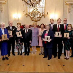 Photograph of Murnane being honored by Ireland’s President Michael D Higgins.